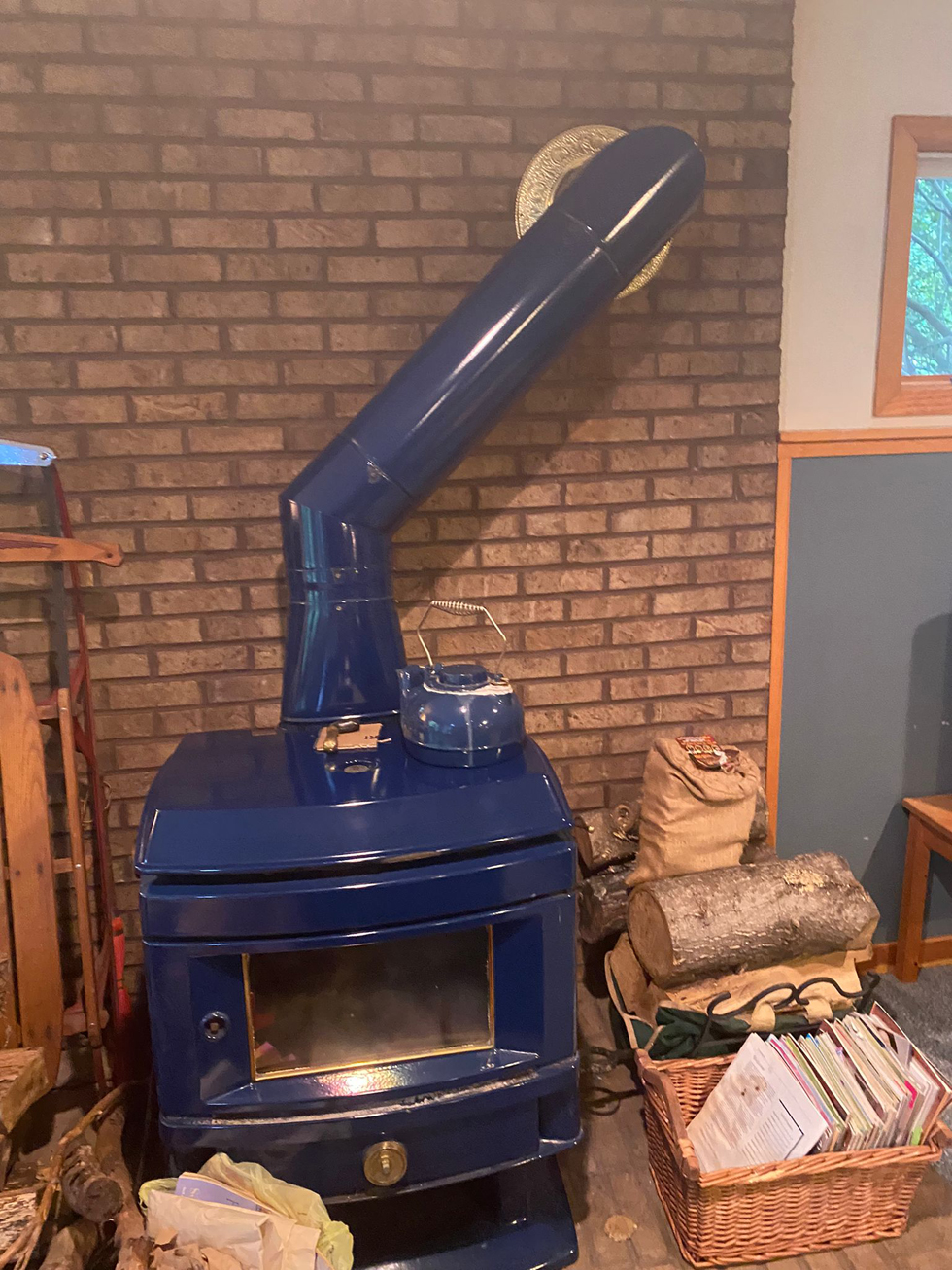 Custom multi-flue stainless steel chimney cap fabricated for a Maryland home